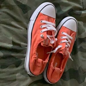 Orange converse slip ons